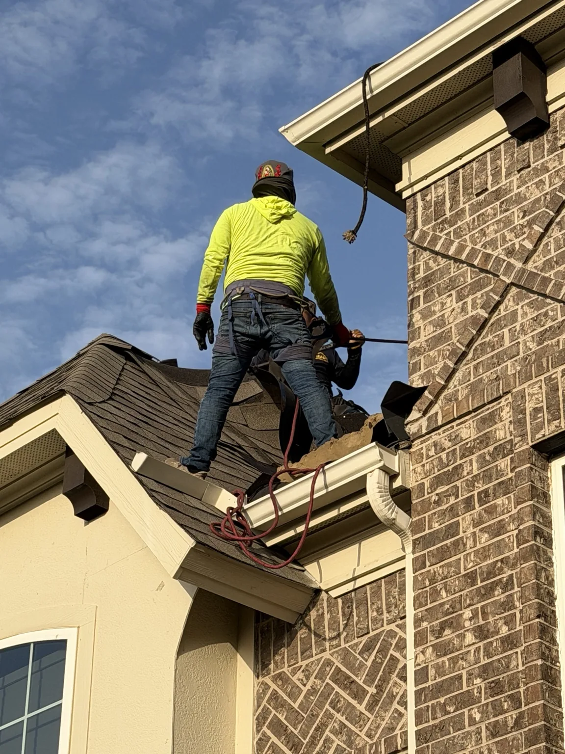 Roofing detail work near eave