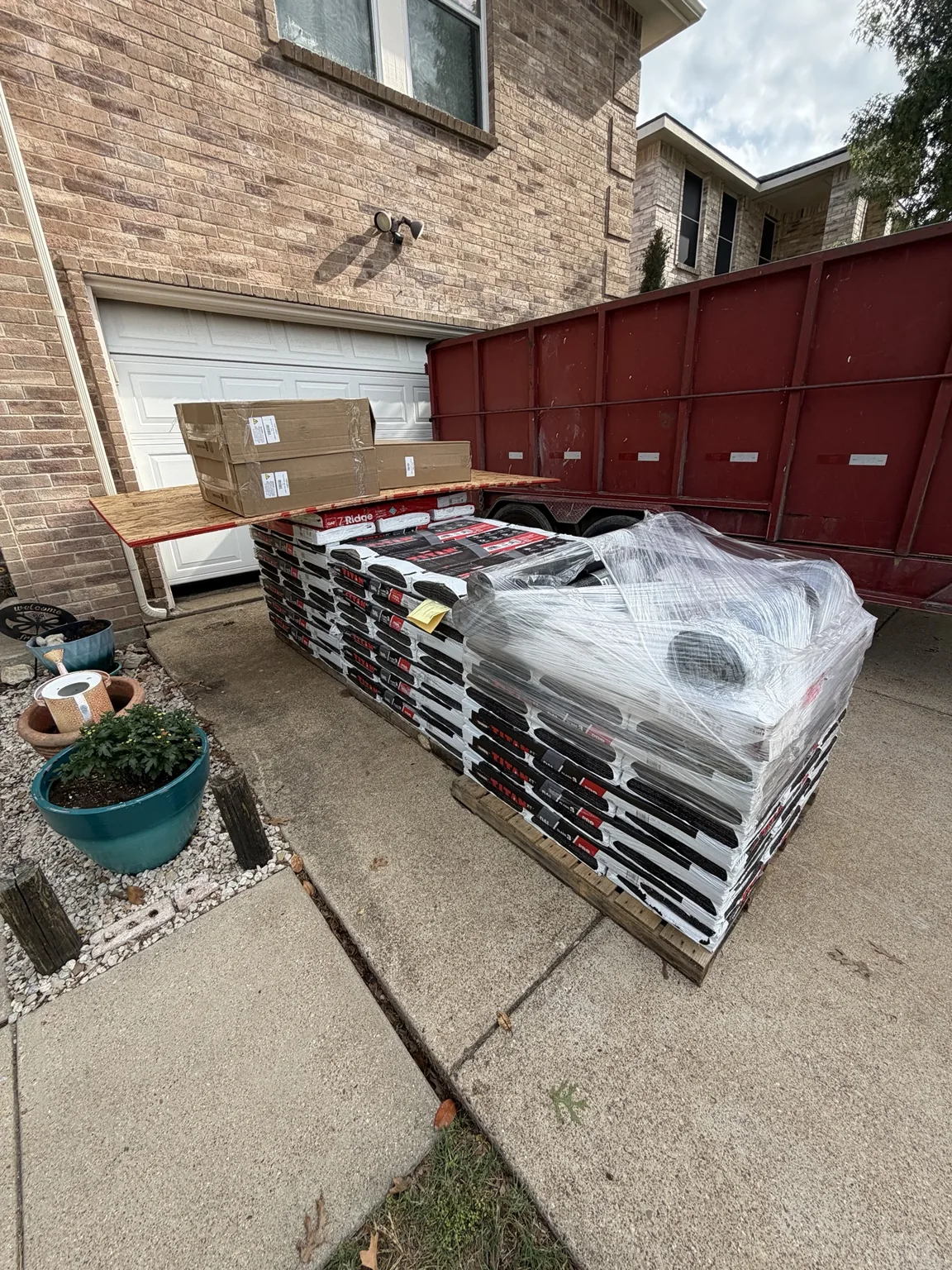 Roofing materials staged for a project